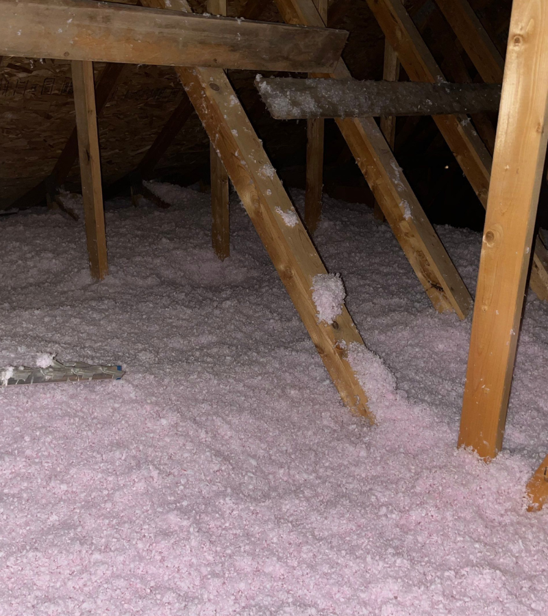 Professional blown-in attic insulation installation helping improve energy efficiency, reduce heat loss, and increase indoor comfort in a Minnesota home.