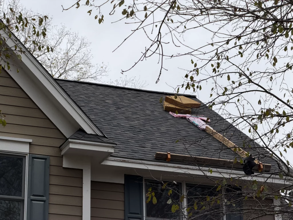 Roof repair project on a residential home in Minnesota completed by Capital Siding, Windows & Roofing.