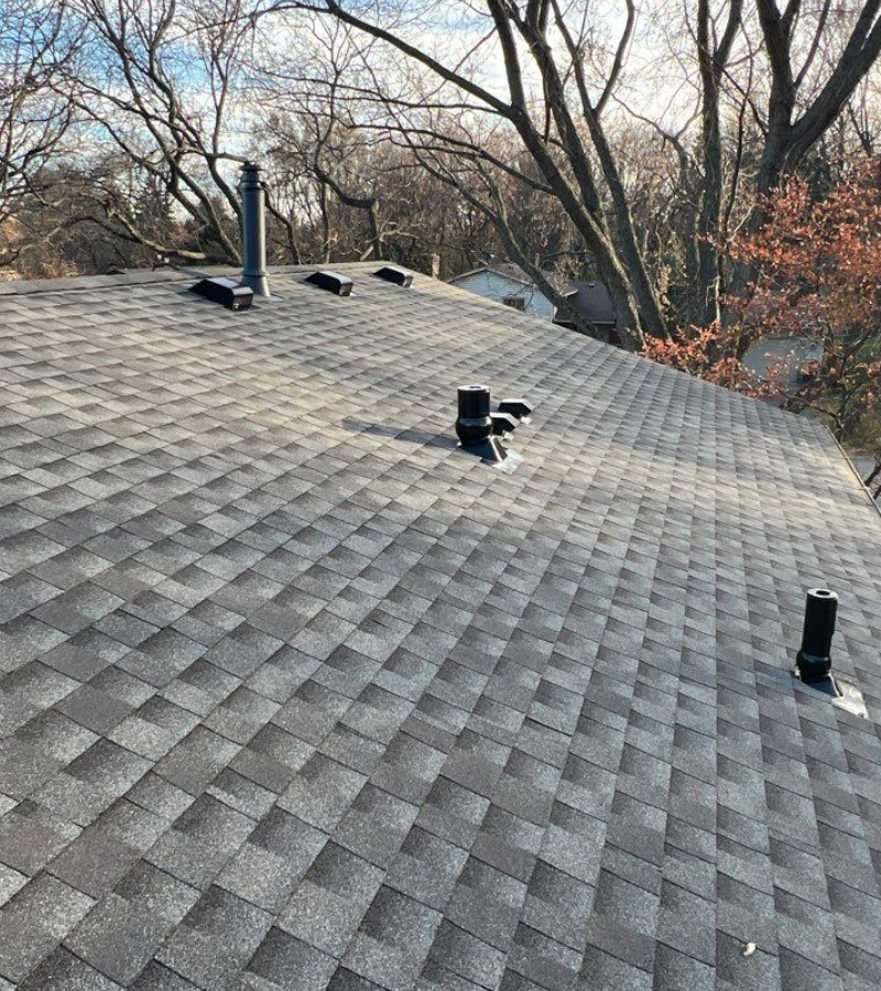 New asphalt shingle roofing system installed on a residential home by Capital Siding, Windows & Roofing serving Minnesota and Wisconsin.